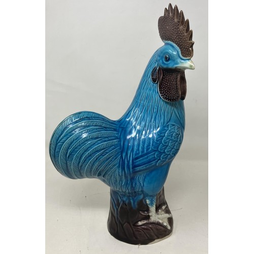 1525 - A Chinese crackleglaze vase decorated figures, and a blue glazed cockerel, 33 cm high (2)