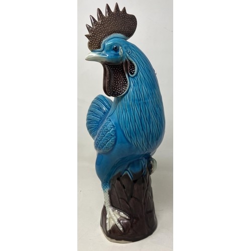 1525 - A Chinese crackleglaze vase decorated figures, and a blue glazed cockerel, 33 cm high (2)