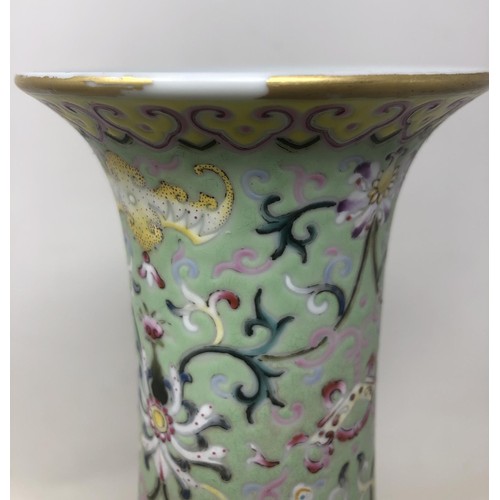 1527 - A Chinese vase, decorated flowers in enamel colours, character mark to base, 36 cm high