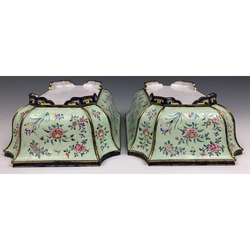 1600 - A pair of Chinese Canton enamel jardinieres, decorated flowers on a pale green ground, 19.5 cm wide ... 