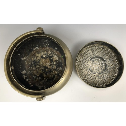 1607 - A Chinese metal censer and cover, with a swing handle, 12.5 cm diameter