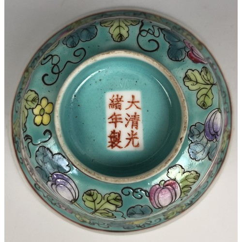 1608 - A Chinese famille verte tea bowl, six character mark to base, 10 cm diameter