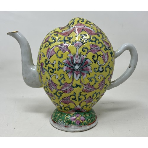 1615 - A Chinese Cadogan style teapot, of melon form, decorated bats and floral motifs on a yellow ground, ... 