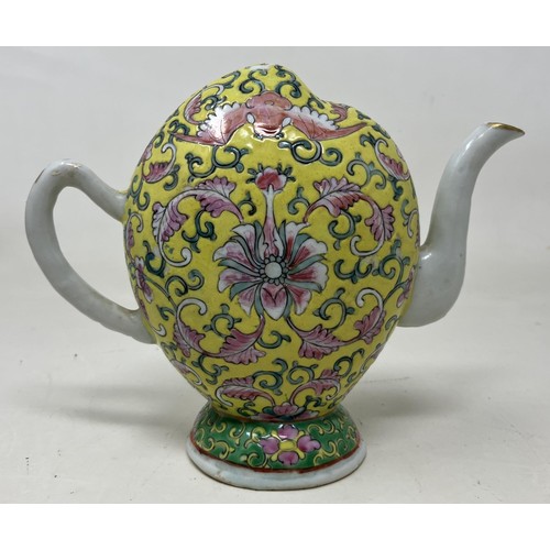 1615 - A Chinese Cadogan style teapot, of melon form, decorated bats and floral motifs on a yellow ground, ... 