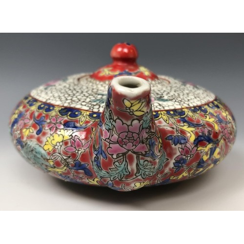 1623 - A Chinese teapot, character mark to base, 15 cm wide