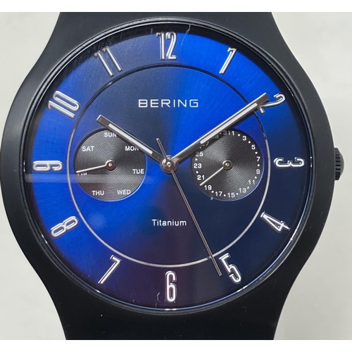 35 - A gentleman's titanium Bering 11939-078, on a stainless steel mesh strap, boxed, with guarantee and ... 