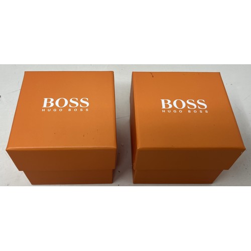 53 - A gentleman's stainless steel Hugo Boss 'Boss Orange' 5 ATM wristwatch, boxed, with warranty booklet... 
