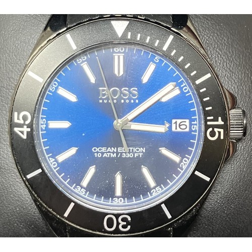 54 - A gentleman's stainless steel Hugo Boss Ocean Edition wristwatch, boxed, with a warranty booklet and... 