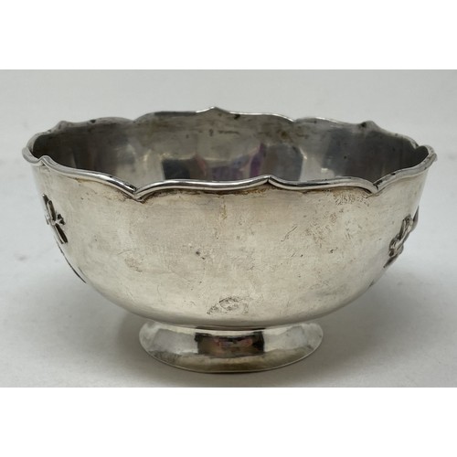 1511 - A Chinese silver coloured metal bowl, decorated prunus, 13 cm diameter