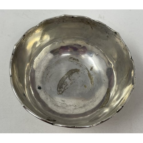 1511 - A Chinese silver coloured metal bowl, decorated prunus, 13 cm diameter