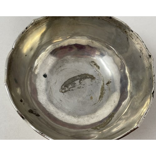 1511 - A Chinese silver coloured metal bowl, decorated prunus, 13 cm diameter