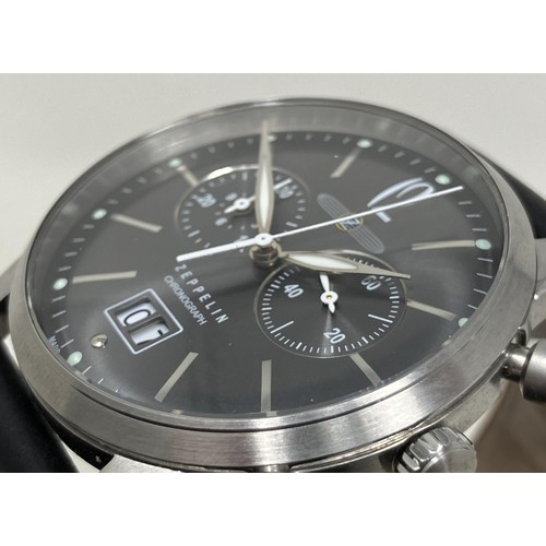 16 - A gentleman's stainless steel Zeppelin Chronograph wristwatch, on a leather strap, boxed, with guara... 