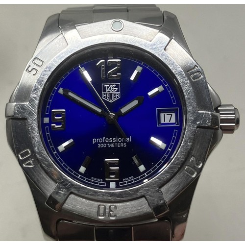 123 - A gentleman's stainless steel Tag Heuer Professional 200 Meters wristwatch, with a blue dial and bra... 