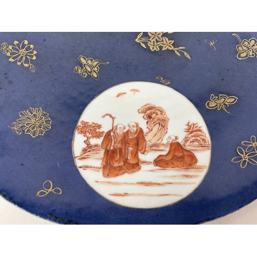 1503 - A Chinese powder blue charger, with three roundels, decorated figures, 33 cm diameter