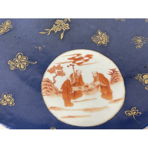 1503 - A Chinese powder blue charger, with three roundels, decorated figures, 33 cm diameter