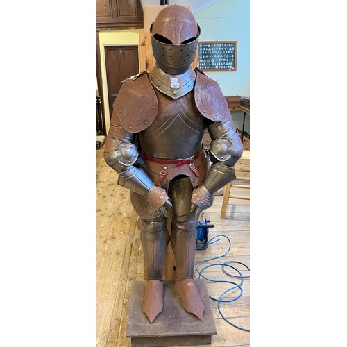 1920 - A 17th century style suit of armour, on a stand, 164 cm high