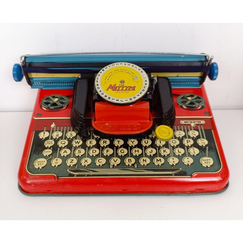 1844 - A Mettype Junior tinplate toy typewriter, boxed, a Pedigree Pretty Peepers doll, boxed, a Vulcan chi... 