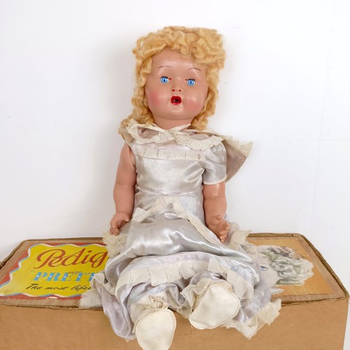 1844 - A Mettype Junior tinplate toy typewriter, boxed, a Pedigree Pretty Peepers doll, boxed, a Vulcan chi... 