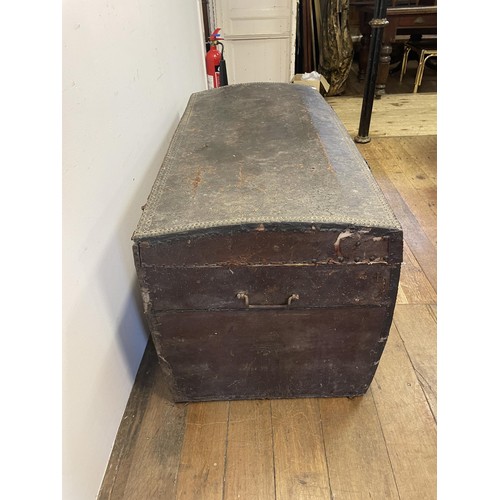 1923 - A leather studded trunk, with metal mounts, 125 cm wide