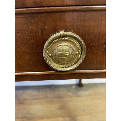 1926 - A Dutch mahogany table, having a raised rim, with a single frieze drawer on cabriole legs and pad fe... 