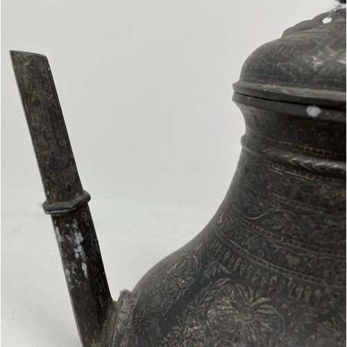 1558 - A Bidriware style ewer, with an hexagonal spout, 20 cm high