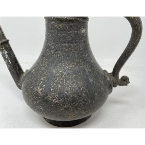 1558 - A Bidriware style ewer, with an hexagonal spout, 20 cm high