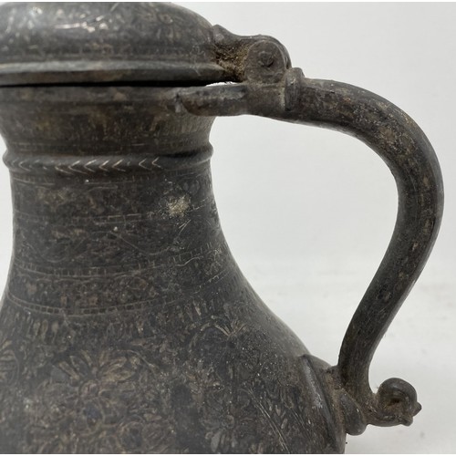 1558 - A Bidriware style ewer, with an hexagonal spout, 20 cm high