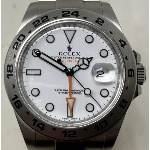 137 - A gentleman's stainless steel Rolex Explorer II wristwatch, with a white dial, boxed, with a tag, a ... 