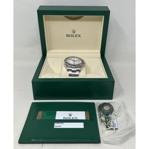 137 - A gentleman's stainless steel Rolex Explorer II wristwatch, with a white dial, boxed, with a tag, a ... 