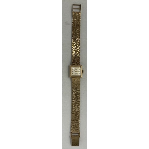 138 - A ladies 9ct gold Rolex wristwatch, on a 9ct gold strap, in a Rolex box