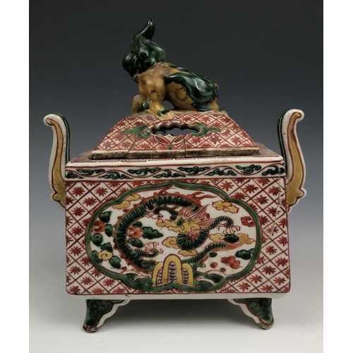 1585 - A pair of Chinese two handled censers and covers, decorated dragons, 17 cm high (2)