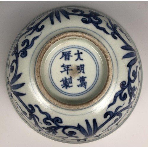 1587 - A Chinese blue and white bowl, six character mark to base, 16 cm diameter