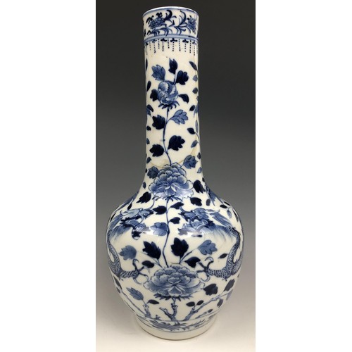 1589 - A Chinese blue and white vase, decorated a dragon, four character mark to base, 30 cm high