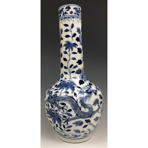 1589 - A Chinese blue and white vase, decorated a dragon, four character mark to base, 30 cm high