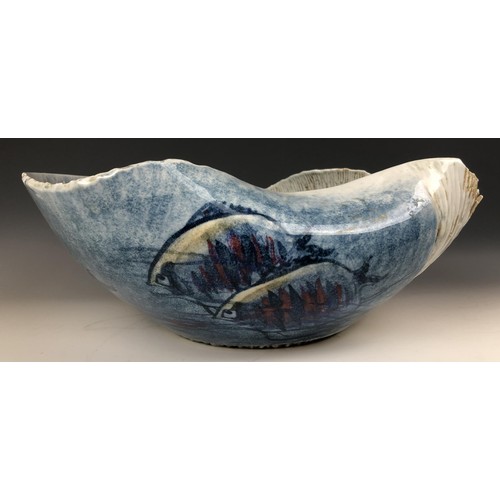 1522 - A modern Japanese art pottery bowl, of irregular form, decorated fish, signed, 46 cm wide