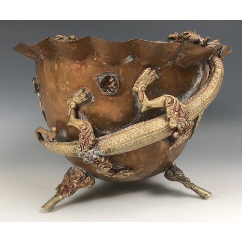 1546 - An Eastern brass oil lamp, 60 cm wide, and a brass and copper vase, decorated dragons, 49 cm high an... 