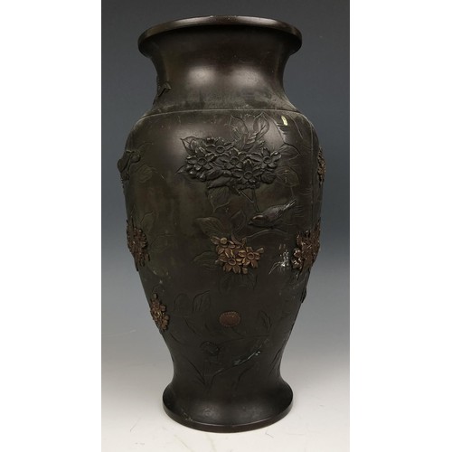 1570 - A Japanese bronze vase, decorated birds and foliage, impressed mark to base, 30 cm high