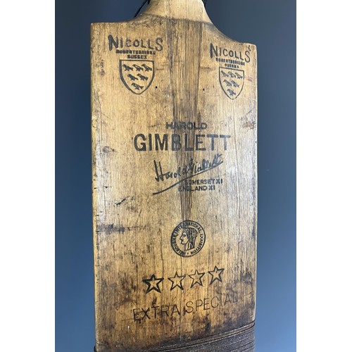 635 - A vintage Gimblett cricket bat, a set of pads, a leather cricket bag, two blazers and assorted other... 