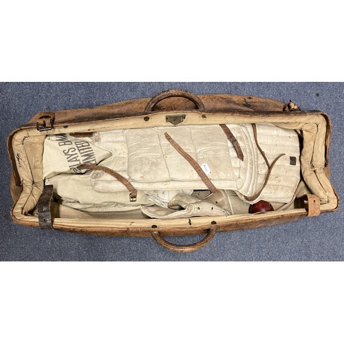 635 - A vintage Gimblett cricket bat, a set of pads, a leather cricket bag, two blazers and assorted other... 