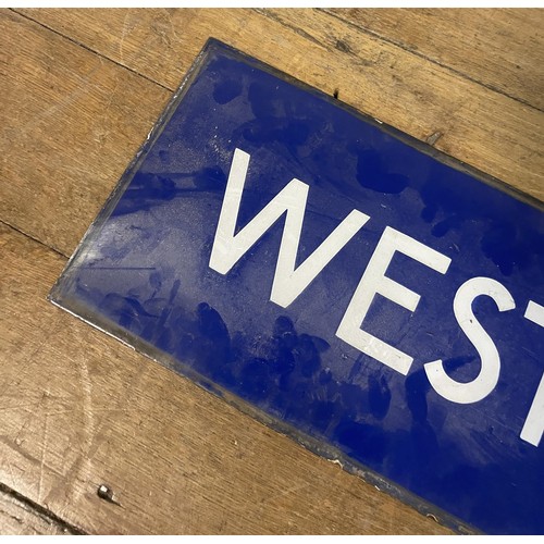 367 - A London Underground enamel sign, West Kensington, 28 x 150 cm