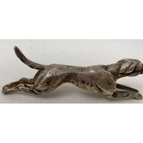 719 - A pair of novelty silver knife rests, in the form of running hounds