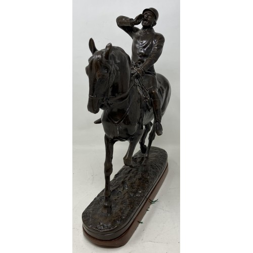 716 - A John Willis Good bronze group of a huntsman on a horse calling for hounds, on a later mahogany bas... 