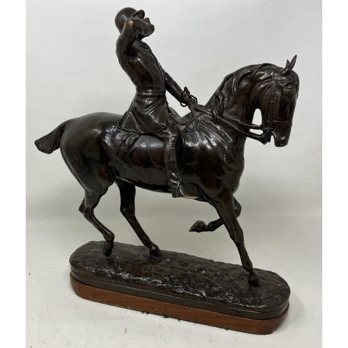 716 - A John Willis Good bronze group of a huntsman on a horse calling for hounds, on a later mahogany bas... 