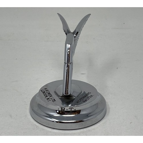 265 - A rare Bentley desk paperweight, in the form of a backward winged Bentley mascot, inscribed H.R. Owe... 