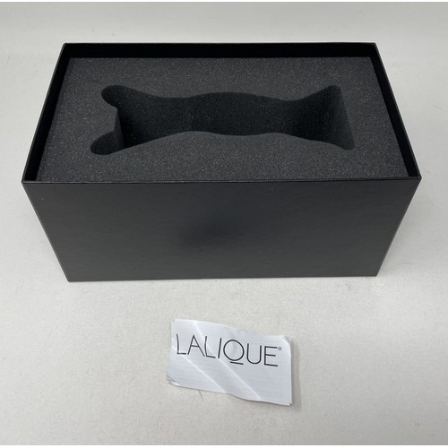 268 - A Lalique frosted glass Vitesse mascot paperweight, in original Lalique box, signed to base with cor... 