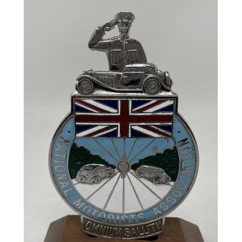 270 - A rare 1930s National Motorists Association multi-coloured rare car badge, featuring a Jaguar SS100 ... 