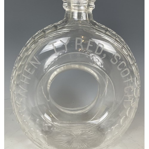 282 - A novelty ‘When Tyred, Scotch’ cut glass whisky decanter, pre-war, in the form of an early motorcar ... 