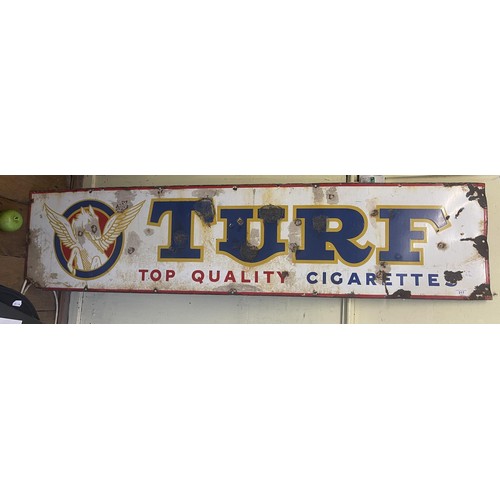 217 - An enamel sign, Turf Top Quality Cigarettes, 38 x 163 cm