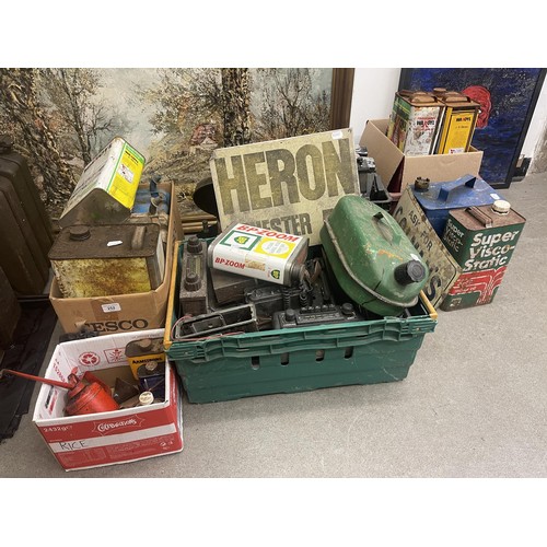 252 - A large group of assorted oil, other cans, radios and automobilia