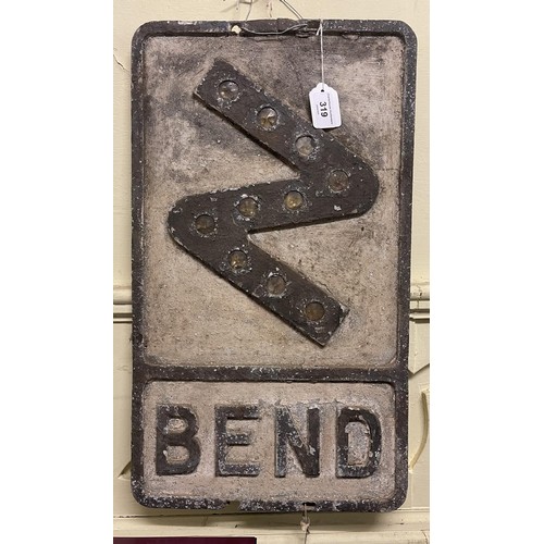 319 - An early aluminium road sign, Bend, with reflective cats-eye inserts, 53 x 30.5 cm